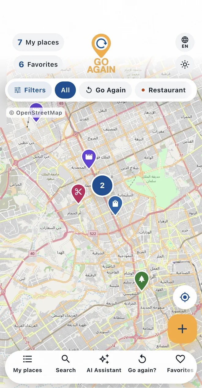 The GO AGAIN map with saved places as coloured pins, the filter bar at the top and the buttons at the bottom
